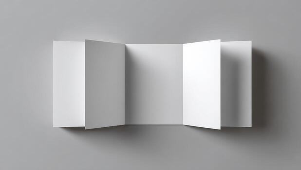 White folded open book on a gray background photo