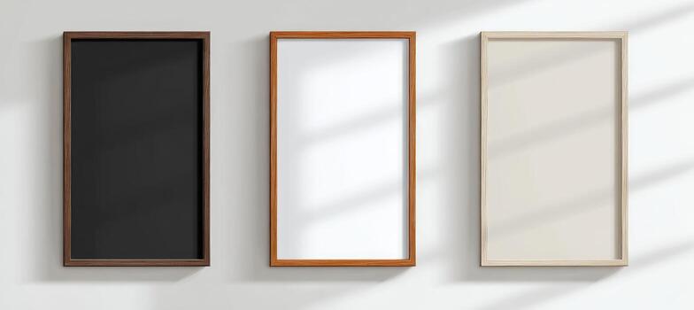 Three rectangular frames on a wall with shadow photo