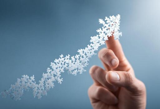 Hand pointing to a puzzle piece on a blue background photo