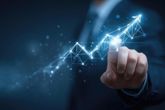 Businessman hand pressing up arrow on graph line photo