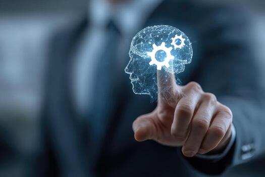 A man in a suit is pointing at a brain with gears photo