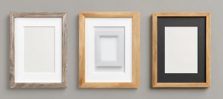Three wooden frames on a wall with a mirror photo