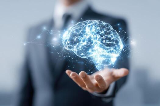 Businessman holding a brain with network lines photo