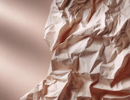 Crumpled paper background with light reflection photo