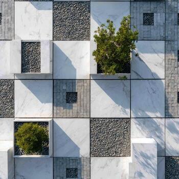 A white wall with squares and trees photo