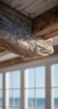 A wooden beam with a view of the ocean photo