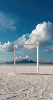 A white frame sitting on the sand in the middle of a desert photo