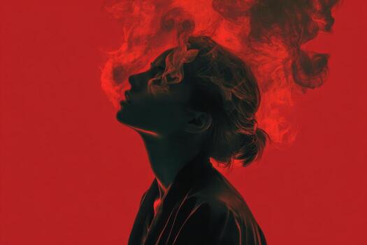 A person stands in profile with a cloud of smoke rising from their head, set against a bold red background. The contrast highlights the features and creates a striking visual effect photo
