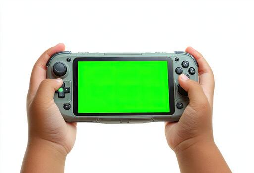 un niño manos sostener un Mano juego de azar consola con un blanco verde pantalla en contra blanco foto