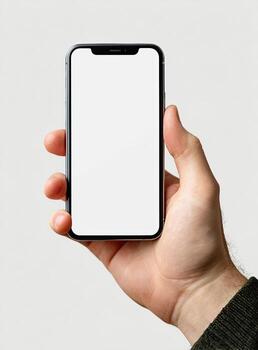 un mano sostiene un moderno teléfono inteligente con un blanco blanco pantalla en contra un ligero gris antecedentes foto