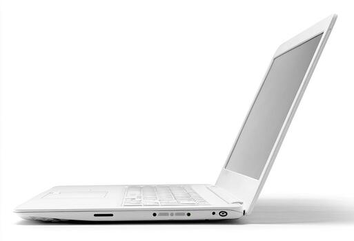 Profile view of a white laptop computer photo