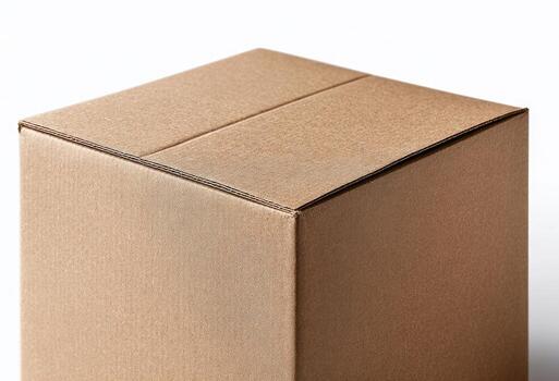 Close-up of a plain, unopened cardboard box, isolated against a bright white background photo