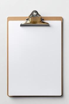 Top-down shot of a clipboard with a blank white paper photo