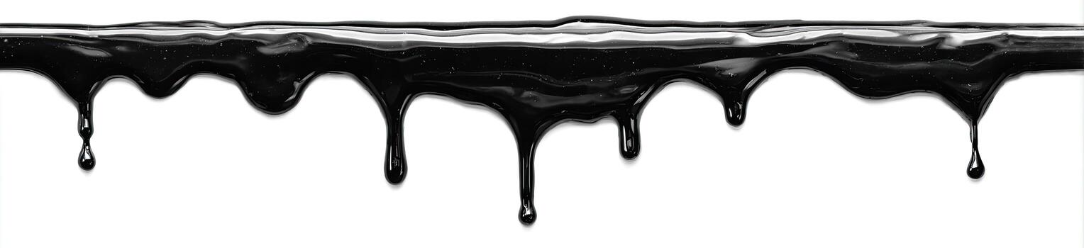 A strip of thick, glossy black substance is melting, dripping against a white backdrop photo