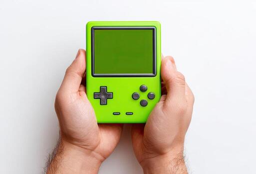 A pair of hands holding a bright green handheld game console, display lit photo
