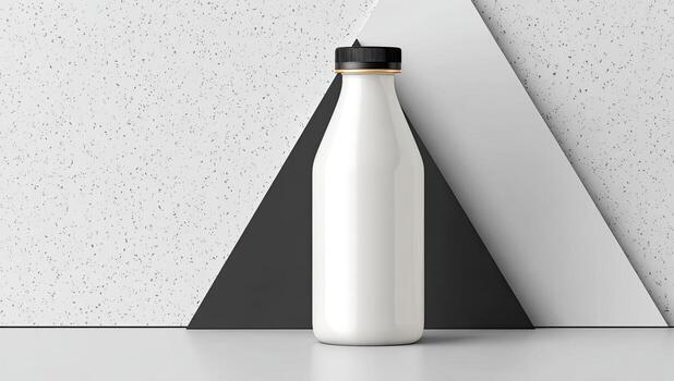 A sleek white bottle with a black cap stands against a minimalist geometric backdrop photo
