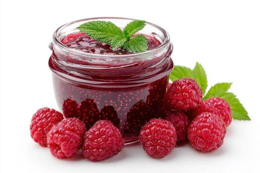 Raspberry jam in a jar with fresh raspberries on a white background photo