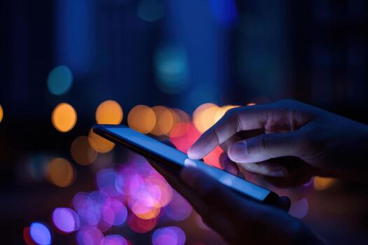 Point finger on screen phone close up, person testing test message, touch blue screen on smartphone. Night Bokeh Light. Close-UP. Person using in hands mobile phone close up in the dark. Online wi-fi photo