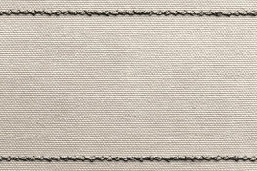 Blank White Rectangular Label with Stitched Border Edges for Text Space. Pristine fabric clothing label with tightly woven textile texture. Leather Jeans label mockup. Clear adherent tag. Empty oblong photo