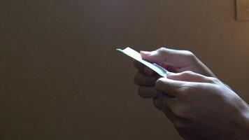Close-up of Hands Carefully Handling a Thin, Fragile Item video
