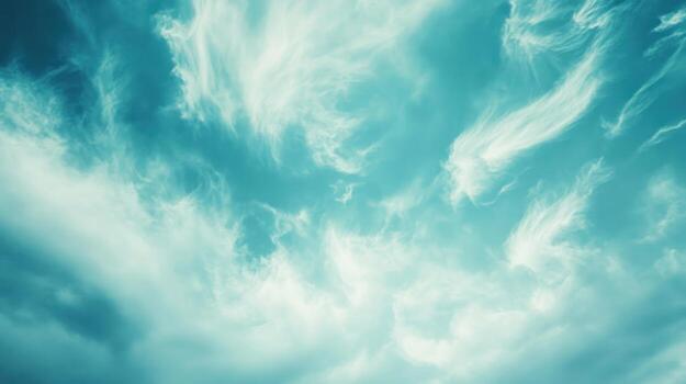 Cloudy turquoise sky photo