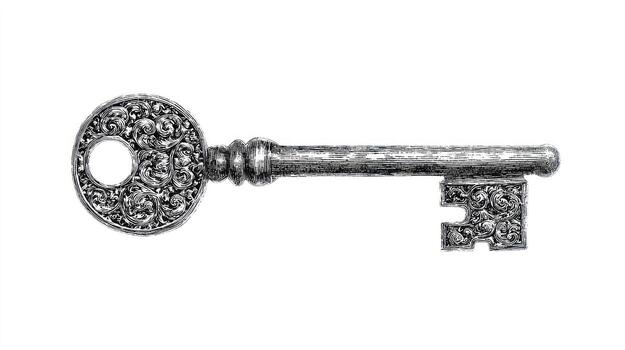 Ornate key illustration in black and white on a clean background photo