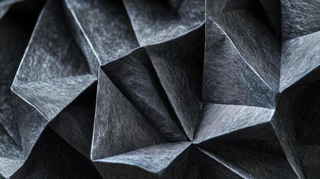 intrincado pliegues de oscuro gris papel foto