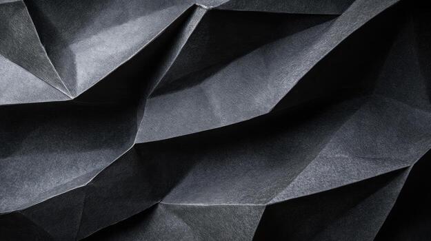 Abstract dark gray paper folds photo