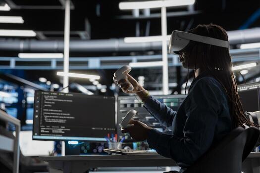 Data center engineer wearing VR equipment using artificial intelligence neural networks technology. Server farm employee using virtual reality headset and AI programming language to configure hardware photo