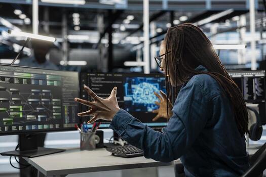 Overjoyed admin satisfied after making data center equipment run artificial intelligence and machine learning. Delighted server farm employee pleased by progress in using AI visual programming tools photo