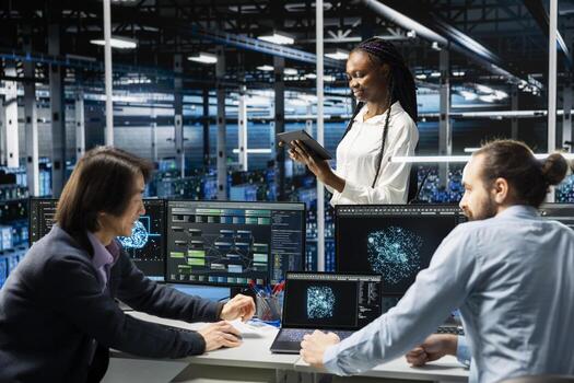 Teamworking data center admins adjusting neural networks model parameters to upgrade systems. Server room IT colleagues scheduling machine learning ran maintenance for infrastructure components photo