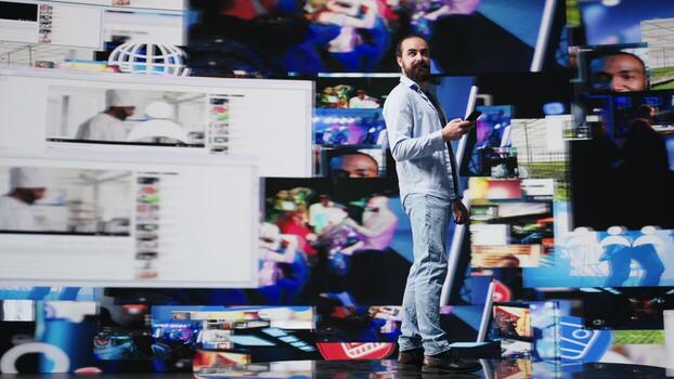 High tech lifestyle of a young guy scrolling through real time notifications, enjoying stream interaction and creative content in a modern virtual social network environment. Camera B. photo