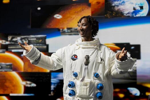 Joyous astronaut analyzing Mars planetary data in spacecraft powered by advanced engineering. Happy starship crew member exploring deep space, doing Martian surface research photo