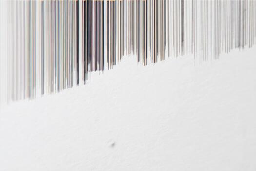 Glitch lines creating art on a plain white wall in a modern setting photo