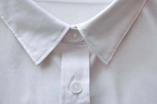 Hidden button placket design of a white shirt with a sleek finish photo