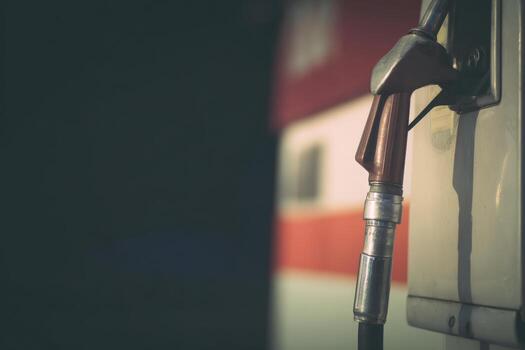 Retro style gas station pump handle shows classic design and unique charm photo