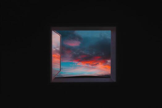 Surreal sky view from a window revealing vibrant colors at dusk photo