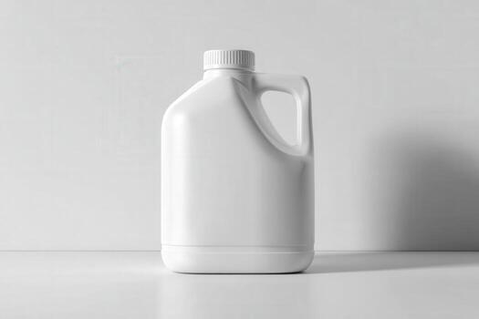 White plastic chemical container on a plain surface with simple design photo