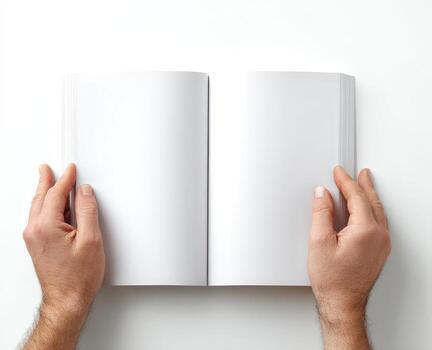 Hands holding open book on white background photo
