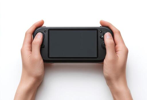 Hands holding a sleek black portable gaming console against a pristine white background photo