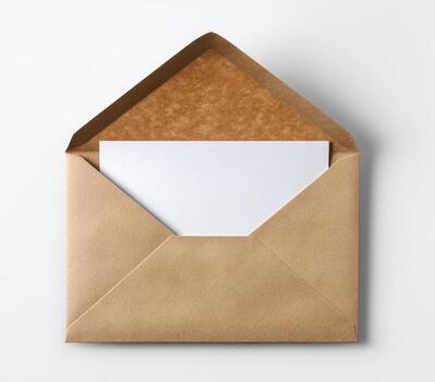 Open, brown envelope with white card. Flat lay on a white background with soft shadows photo