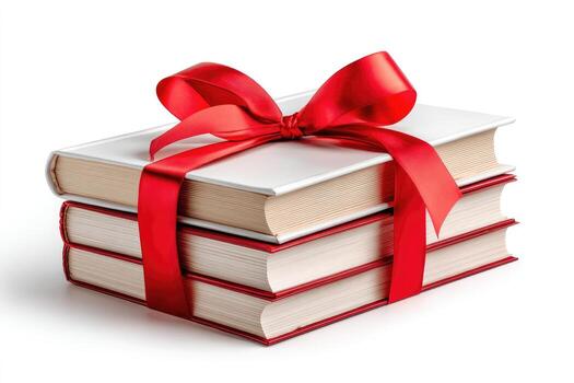 Stack of three books with white covers and a bright red ribbon tied in a bow photo
