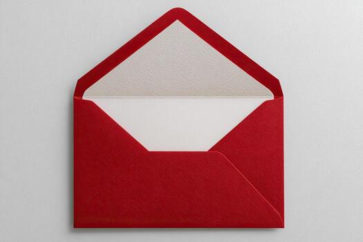 Open red envelope on white surface, showing interior. Close-up shot, simple design photo