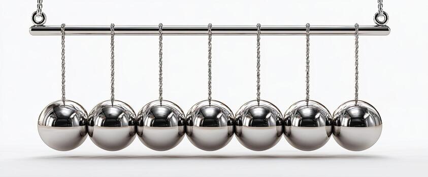 A metallic Newton's cradle with seven chrome spheres suspended from a horizontal bar. White background photo