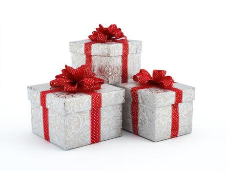 Three ornate, patterned gift boxes tied with red ribbon and bows, stacked on white photo