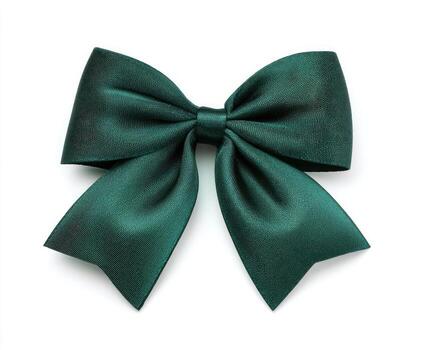 A close-up shot of a satin bow in a dark green color, isolated on a clean white background photo