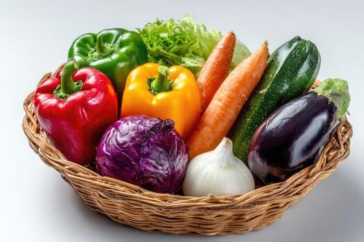un mimbre cesta desbordante con vistoso, Fresco vegetales en contra un blanco antecedentes foto