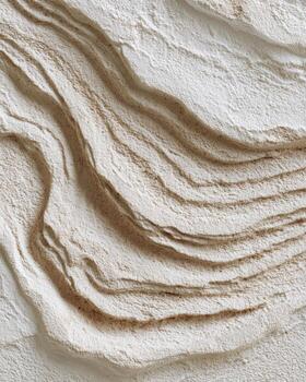 Beige textured surface with flowing lines photo
