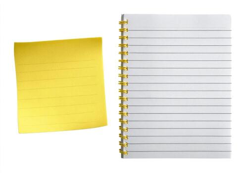 Blank yellow sticky note beside lined notebook photo