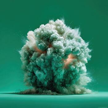 Exploding sphere of light-grey smoke and dust against a teal backdrop photo
